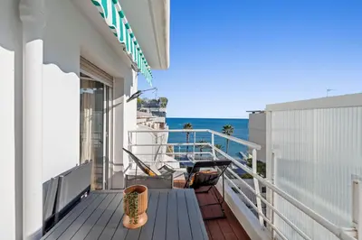 a balcony with a view of the ocean at REF 2037 - Apartment for Rent Sea View in Cannes