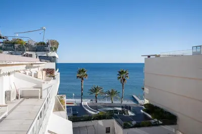 a view of the ocean from a building at REF 2037 - Apartment for Rent Sea View in Cannes