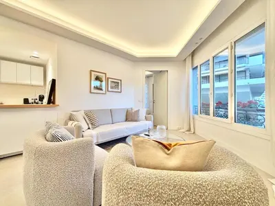 a living room with two chairs and a couch at Cannes 2 bedrooms & 2 bathrooms apartment - 24P2 in Cannes