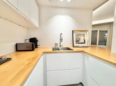 a kitchen counter with a sink and a microwave at Cannes 2 bedrooms & 2 bathrooms apartment - 24P2 in Cannes