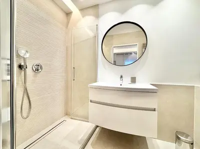 a bathroom with a sink and a mirror at Cannes 2 bedrooms & 2 bathrooms apartment - 24P2 in Cannes