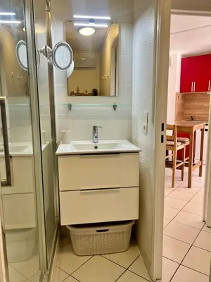 a bathroom with a sink and a shower at Sea Cocoon La Bocca in Cannes