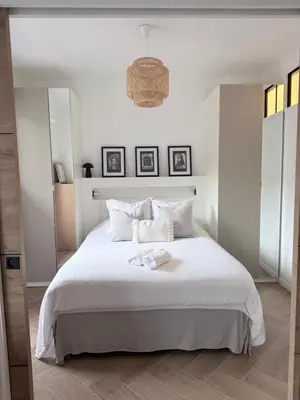 a bedroom with a bed and a large mirror at Premium address for trade shows and conferences in Cannes 5min walk to Palais des Festivales in Cannes