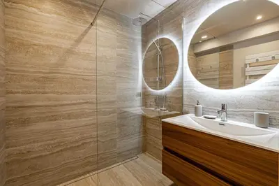 a bathroom with a sink and a mirror at Apartment for 4people in Martinez in Cannes