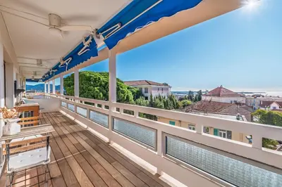 a balcony with a view of the ocean at Marius By Terrys Homes in Cannes