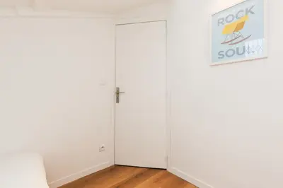 a room with two white closets and a couch at Immogroom - 1 Bedroom - City Center - AC in Cannes