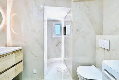 a bathroom with a shower and a toilet at Repère des Artistes - central, 3mn from Beach, 10mn Palais, modern, AC, balcony in Cannes