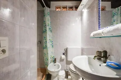 a bathroom with a toilet and a sink and a shower at Immogroom - 2 Bedroom - Close to citycenter in Cannes