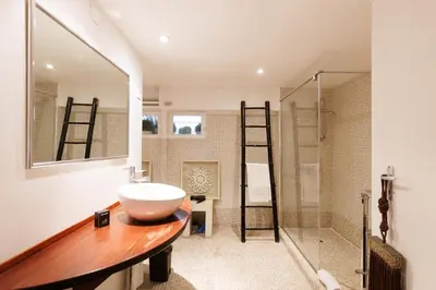 a bathroom with a sink and a shower at Loft Gallia YourHostHelper in Cannes