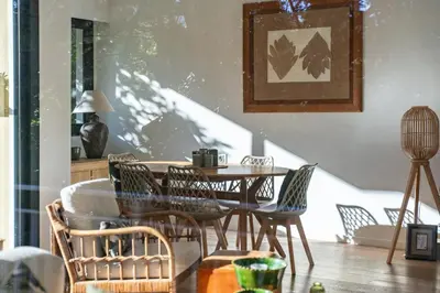a dining room with a table and chairs at COZYSTAY 1827 - Beautiful 3-room apartment with large private terrace in Cannes