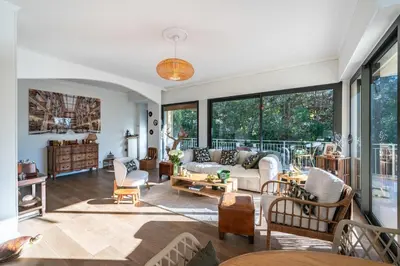 a living room with a couch and chairs at COZYSTAY 1827 - Beautiful 3-room apartment with large private terrace in Cannes