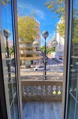 a view of a city street from a window at Smart 2 Apart - Le 62 Cannes in Cannes