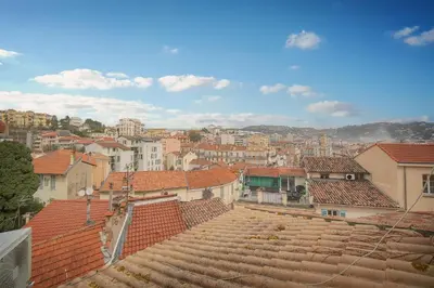 a view of a city with red tile roofs at Cannes hyper centre -palais du festival -croisette -quartier historique du suquet in Cannes