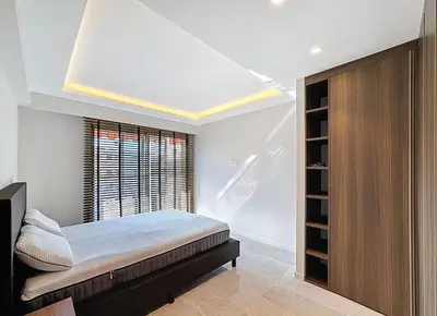a bedroom with a bed and a window at New Modern rooftop 2 ch 4 peoples Clim Wifi in Le Cannet