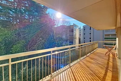 a balcony with a view of a tree at HENRI CAMILLE RE -Wios- 2 bedrooms APT - Huge terrace sea view in Cannes