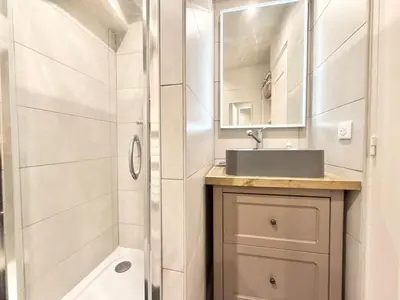 a bathroom with a sink and a shower at Elegant studio à Cannes - Suquet - 2 people in Cannes