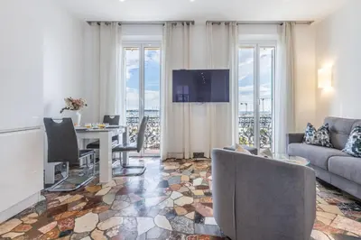 a living room with a couch and a table at 2 chambres-BALCON-VUE MER-FELIX FAURE A2B231 in Cannes