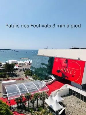 a building on the beach next to the ocean at 2 pièces Moderne FELIX FAURE-VIEUX PORT A1B232 in Cannes