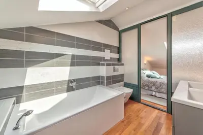 a bathroom with a tub and a toilet and a sink at DUPLEX 2 chambres -TERRASSE Vue MER-FELIX FAURE A2B024 in Cannes