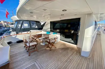 a living room on a boat with a couch and a table at Yacht FALCON FIVE in Cannes