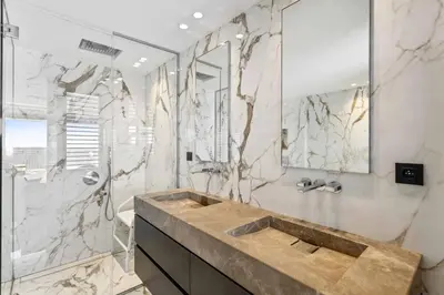 a bathroom with a sink and a shower at REF 2043 - Cannes Penthouse with panoramic sea view for rent in Cannes