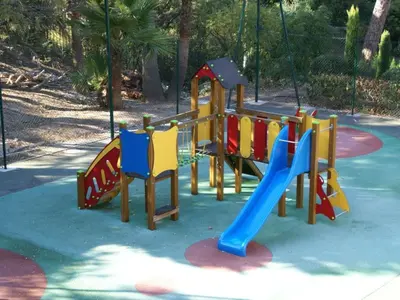 a playground with a slide in a park at Apartment Villa Francia-5 by Interhome in Cannes