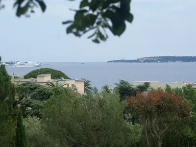 a view of a large body of water with trees at Scenic villa in Cannes with private pool in Cannes