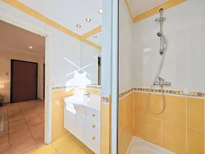 a bathroom with a shower and a sink at Viva Riviera Residence Commandant André in Cannes