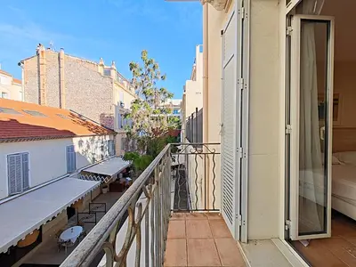 a balcony with a view of a building at Viva Riviera Residence Commandant André in Cannes