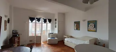 a living room with a couch and a table at Studio Montfleury in Cannes
