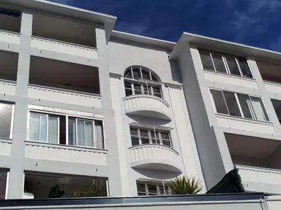 a white building with balconies on the side of it at Studio Montfleury in Cannes