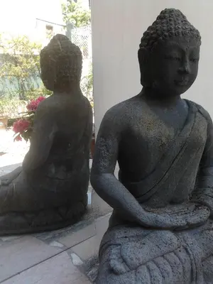 a statue of a woman sitting on the floor at Grand Studio Terrasse Proche Palais des Festivals in Cannes