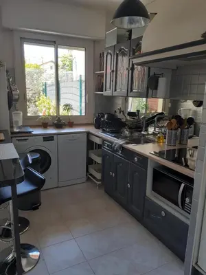 a kitchen with a sink and a stove at Grand Studio Terrasse Proche Palais des Festivals in Cannes