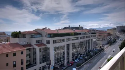 a view of a city street with buildings at 3 pièces 4 étoiles Vue Mer Parking Fibre 500m Palais Festivals in Cannes