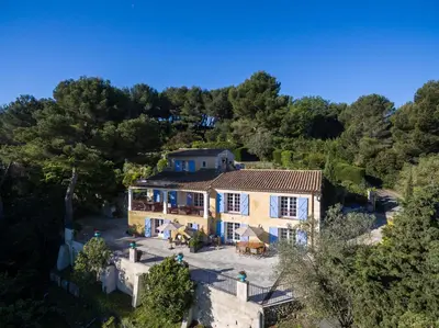 an aerial view of a house in a forest at Villa Le Port d'attache in Vallauris