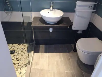 a bathroom with a sink and a toilet at Suquet Charm in Cannes