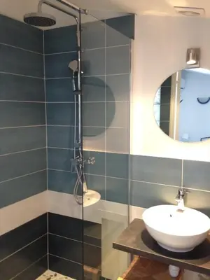 a bathroom with a sink and a shower at Suquet Charm in Cannes