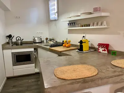 a kitchen with a sink and a counter top at Appartement Le Suquet proche Croisette in Cannes