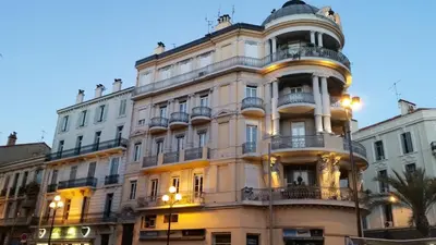 a building in the city at night at Chez Grace in Cannes