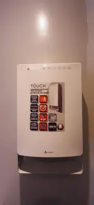 a refrigerator with a microwave with a tv on it at Cannes Riviera in Cannes