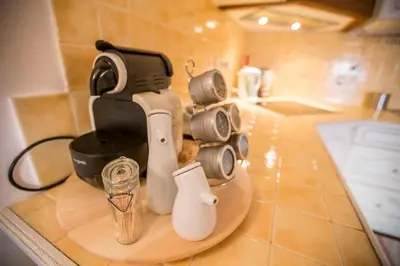 a kitchen counter with a mixer on a counter top at Le Suquet Style by Connexion in Cannes