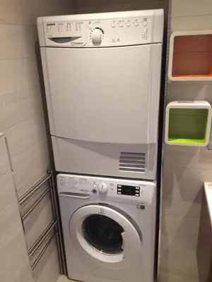 a washer and dryer in a small room at Le Suquet Style by Connexion in Cannes