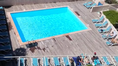 an overhead view of a swimming pool on a deck at SOPHIES HOMES FÉLIBRIGES BEACH & PALAIS des FESTIVALS in Cannes