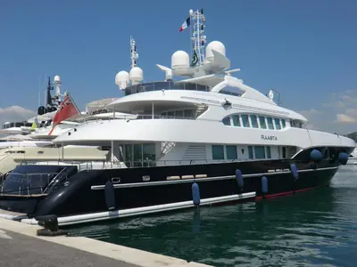 a large yacht is docked in the water at Cannes - view Cap Esterel in Cannes