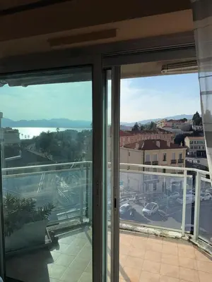 a balcony with a view of a city at Villa Rimbaud in Cannes