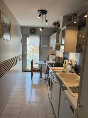 a kitchen with a sink and a dishwasher at Villa Rimbaud in Cannes