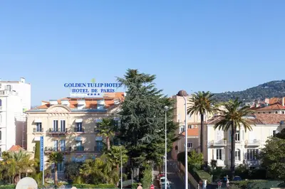 a building with a sign on top of it at Apartment29 in Cannes