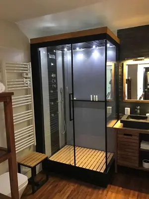 a bathroom with a shower with a toilet and a sink at Appartement Residence Athena in Cannes