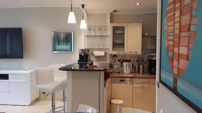 a kitchen with a sink and a counter top at Elegant Apart in City Centre of Cannes in Cannes