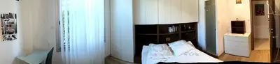 a bedroom with a bed with a black headboard at Appartement Cannes sur Croisette in Cannes